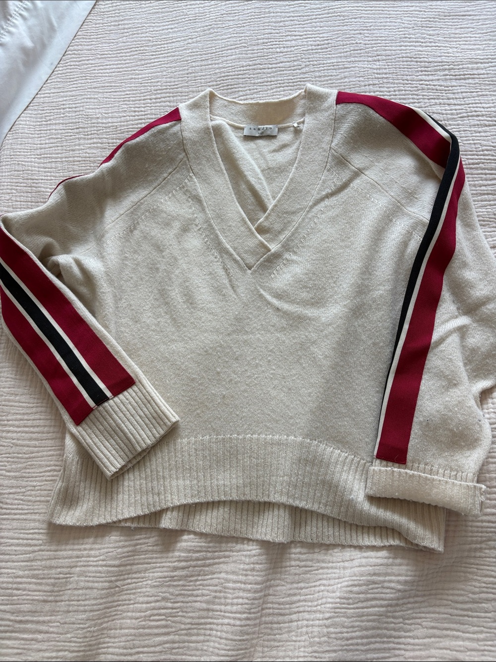 Cream V-Neck Sweater with red and black Stripe Sleeves